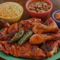 Whole Chicken Plus 2 Side Orders · Grill charcoal chicken. Includes rice, beans (refried or charros, salsas, purple onion, gril...