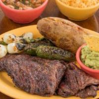 Arrachera Dish · Charcoal arrachera. Beef inside skirt steak. Includes rice, beans (refried or charros) guaca...