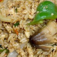 Basil Fried Rice · Basil leaves, onion, bell pepper, fresh mushroom, carrot, Thai chili. Choice of ground chick...