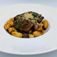 Costata Corta · Beef short ribs slow-braised in a vegetable & red wine reduction over tender potato gnocchi,...