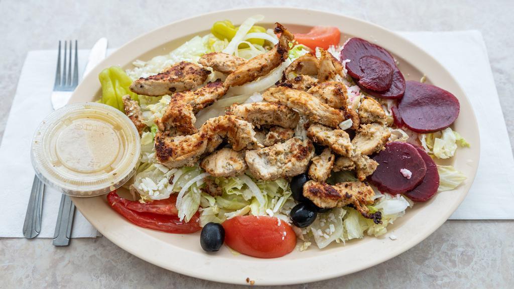Chicken Greek Salad · Served with chicken breast.