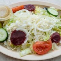 Greek Salad · Crisp lettuce, tomatoes, beets, olives, peppers, onions, Feta cheese, and Greek dressing.