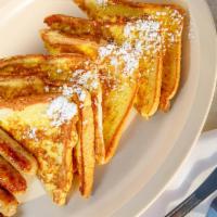 French Toast · Served with choice of bacon sausage or ham.