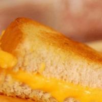 Kids' Meal · Hearty white, American grilled cheese, side item, kids' drink.