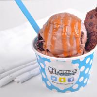 Caramel Brownie · Chocolate base with brownie pieces and caramel swirls. Topped with caramel and brownie britt...