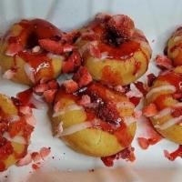 Strawberry Shortcake · Mini donuts topped with strawberry syrup, vanilla icing and freeze dried strawberries.