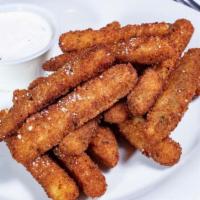Breaded Zucchini · Golden fried zucchini with a sprinkle of parmesan cheese. Served with our homemade red sauce...