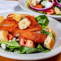 Buffalo Chicken Salad · Romaine, tomatoes, bleu cheese crumbles, and grilled or breaded chicken.