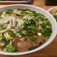 Phở Đặc Biệt / Combination Pho · Brisket, flank, eye of round steak, beef meatball, and tripe.