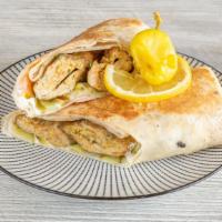 Chicken Kafta Sandwich · Two skewers of ground chicken, garlic sauce, tomatoes pickles served on Lebanon or pita bread.