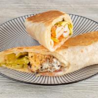 Chicken Tawook Sandwich · 1 skewer of chicken breast cubes with pickles and garlic paste. Served on Lebanon or pita br...