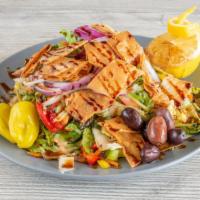 12). Fattoush Signature Salad · A fried pita bowl filled with fresh romaine mixed lettuce, tomatoes, cucumbers, green pepper...