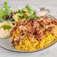 Chicken Shawarma Plate · Chicken shawarma (succulent layers of chicken, rice. Comes with hummus, mix salad.