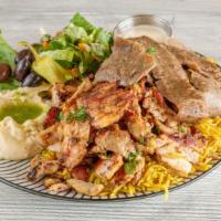 Mix Gyro And Chicken Shawarma Plate · Comes with salad and one side (choice) fries or rice.