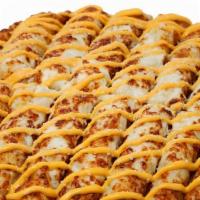 Nacho Cheese Bread · Our classic bread covered in our unique three cheese blend and drizzled with melted nacho ch...