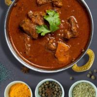 The Return Of Lamb Vindaloo · Tender and boneless lamb traditionally cooked with potatoes, our housemade curry masala, ext...