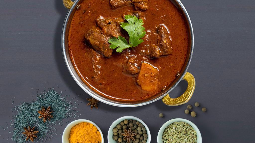 The Return Of Lamb Vindaloo · Tender and boneless lamb traditionally cooked with potatoes, our housemade curry masala, extra garlic, vinegar, and light chili powder.