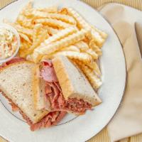 Corned Beef · Thinly sliced and piled high on rye bread.