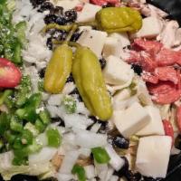 Kitchen Sink Salad · Mushrooms, bell pepper, black olive, tomato, pepperoni, onion, pepperoncini, parmesan, mozza...