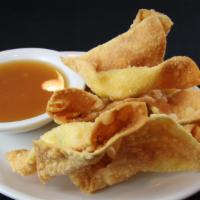 Crab Cream Cheese Wontons · 6 Pieces of crispy wonton wrapper stuffed with crab, Cream cheese, green onions, and carrots...