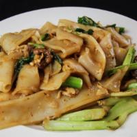 Pad Se Ewe · Wide rice noodle, stir-fried with egg, Chinese broccoli and your choice of meat or tofu. Veg...