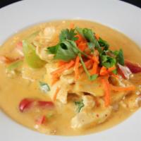 Panang · Red curry with bell peppers, Thai basil, coconut milk, and your choice of meat or tofu in a ...