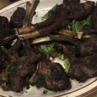 Lamb Chops Dinner · Very tender meat marinated with peanut butter and char-broiled. Served with rice or fries an...