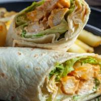Grilled Chicken Caesar Wrap · Fresh grilled chicken topped with crisp romaine, house croutons, grated parmesan cheese topp...