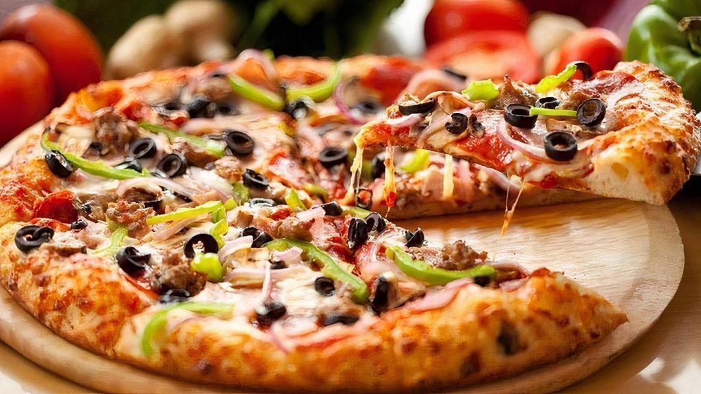 Veggie Pizza · Tomatoes, Mushrooms, Onions, Green Peppers, Banana, Peppers & Black Olives.