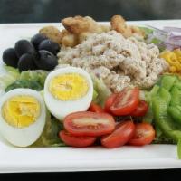 Tuna Salad · Tuna, Lettuce, Tomatoes, Onions, Black 
Olives, Green Peppers, Boiled Eggs, Corn, and Crouto...