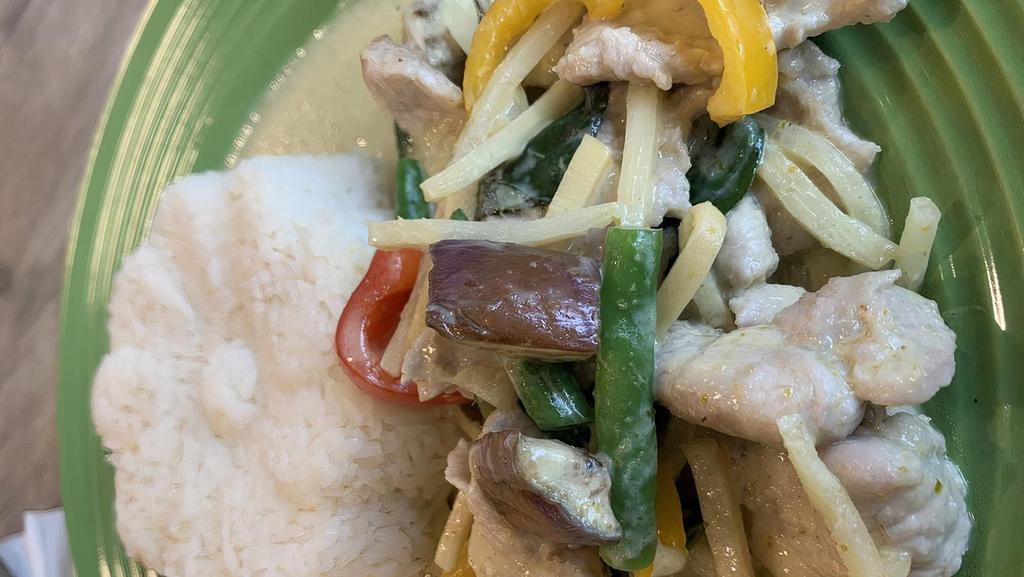 Green Curry · Spicy. Served with choice of steamed rice or steamed vermicelli noodles. Choice of meat cooked in green curry paste and coconut milk, bamboo shoots, eggplants, green beans, bell pepper and thai basil.