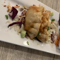 Dumpling · Six pieces. Steamed or fried. Pork, cabbage, green onion and ginger dumpling pan fried. Serv...