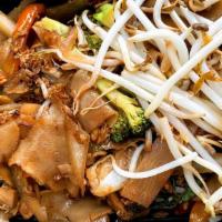 Drunken Noodles · Spicy. Stir fried rice noodles with choice of meat, egg and mixed vegetables (bamboo, brocco...