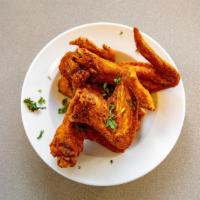 Chicken Wings  · Mexican tempura, chile drMy rub, with your choice of 1 sauce.