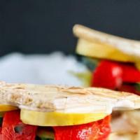 Club-Med Sandwich · Hearts of romaine, cucumbers, grape tomatoes, red olives and feta cheese with our lemon vina...