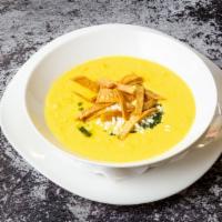 Crema De Elote · Cream of corn soup, fresco cheese, tortilla strips, chimichurri sauce.