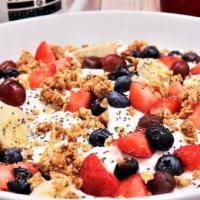 Yogurt Bowl · Topped with fresh fruit, chia seeds, & house made granola. Served with choice of toast.