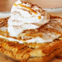 Pumpkin Poptart · Homemade with pumpkin pie filling. Smothered in cinnamon and caramel sauce. Served with whip...