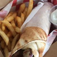 #5 Gyro Sandwich · Thinly sliced seasoned layers of lamb and beef, rolled in pita with lettuce, tomatoes, onion...