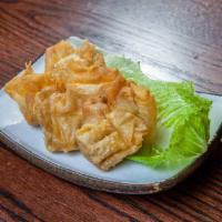 Fried Wontons · Pork and shrimp mix wrapped in a square dough and briefly fried. A smaller version of the Ch...