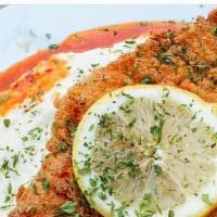 Fish And Grits · Fresh never frozen catfish filet seasoned and fried to perfection.  Resting on a bed of LJ s...