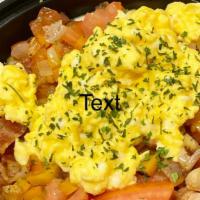 Bowl O'Breakfast · Bowl of creamy homemade grits with your choice of toppings and finished with eggs.