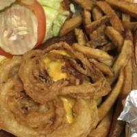 Pretzel Sirloin Burger · Merkt's cheddar cheese, onion straws and bacon on a butter grilled pretzel bun with choice o...