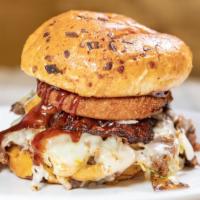 The Prime Burger · (Onion bun) 5 oz. patty, coleslaw, mozzarella sticks, Swiss cheese, bacon, onion ring, BBQ s...