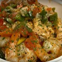 Shrimp & Grits · shrimp and grits, are served with a bed or fresh creamy grits, served with sauteed veggies, ...