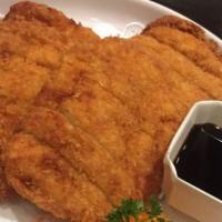 Katsu Chicken · Breaded deep-fried chicken breast with Japanese BBQ sauce. Served with steamed rice.