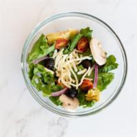 Garden Salad · Leaf lettuce, mozz, onion, tomato, olive, artichoke hearts, mushroom, pepperoni.