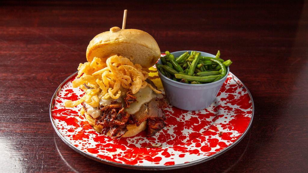 Boss Hog · Pulled pork tossed in Jethro’s secret bbq sauce with Texas bacon, crispy onion strings and Pepper Jack cheese on a freshly baked bun.