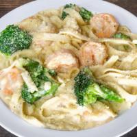Pasta Torito · Fresh fettuccine tossed with Alfredo sauce, Parmesan cheese, shrimp and broccoli.