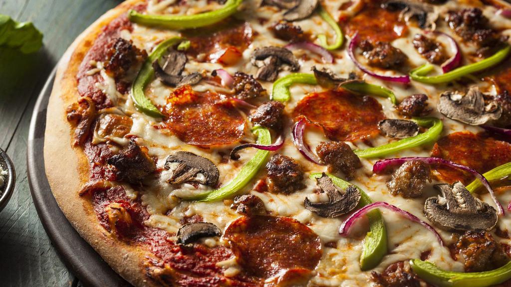South Kc Combo Pizza · A local favorite! Our fresh, made daily pizza dough topped with seasoned ground beef, Italian sausage, banana peppers, onions, our house-made marinara sauce, and stretchy Italian cheese blend. Baked until bubbling and golden.
